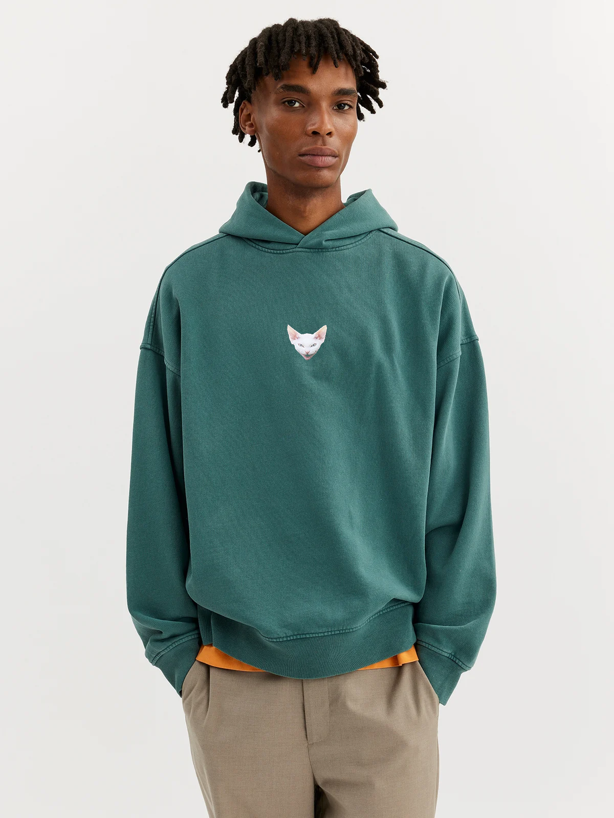 guy wering sand hoodie