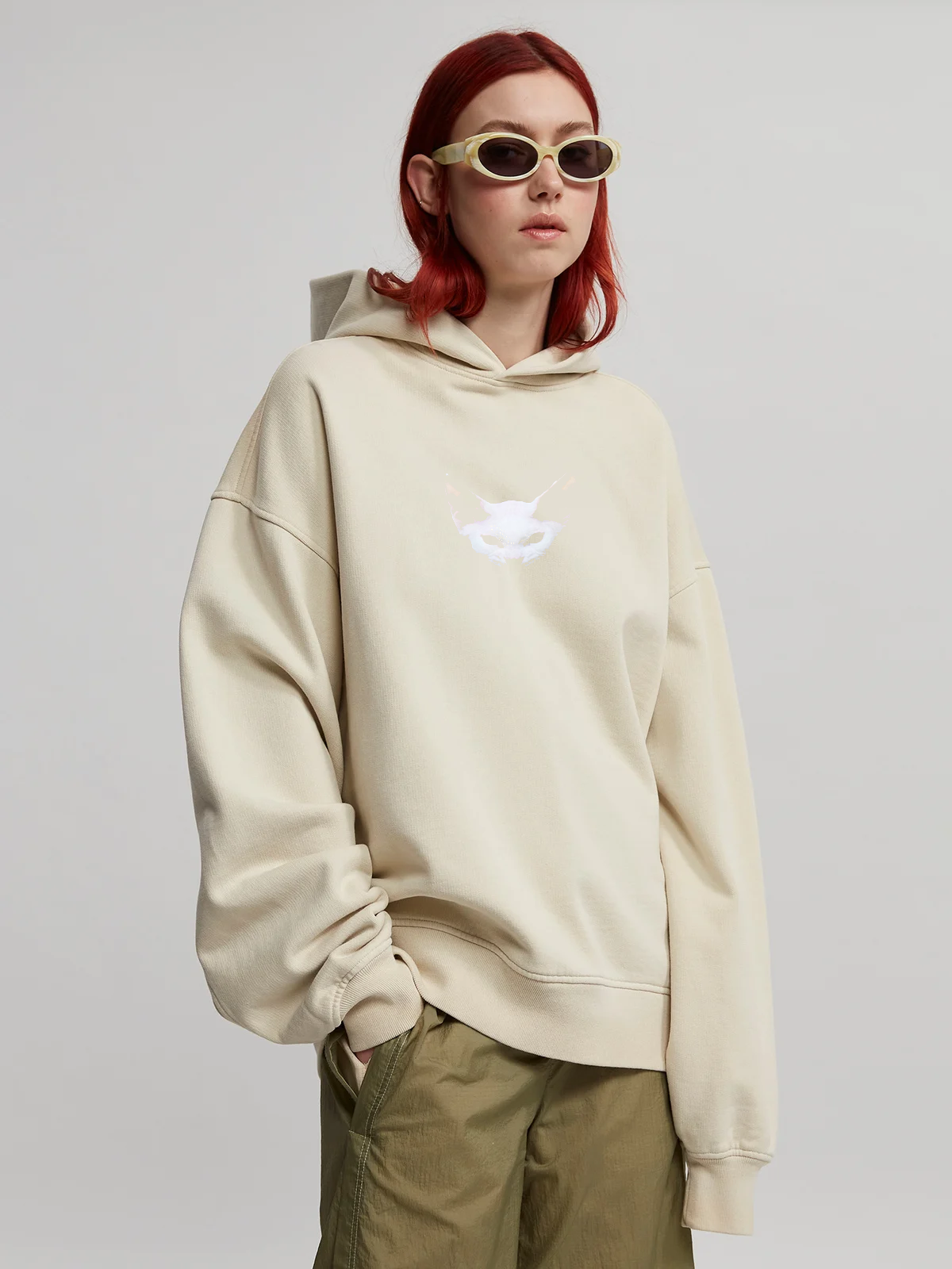 Woman wearing desert sand hoodie