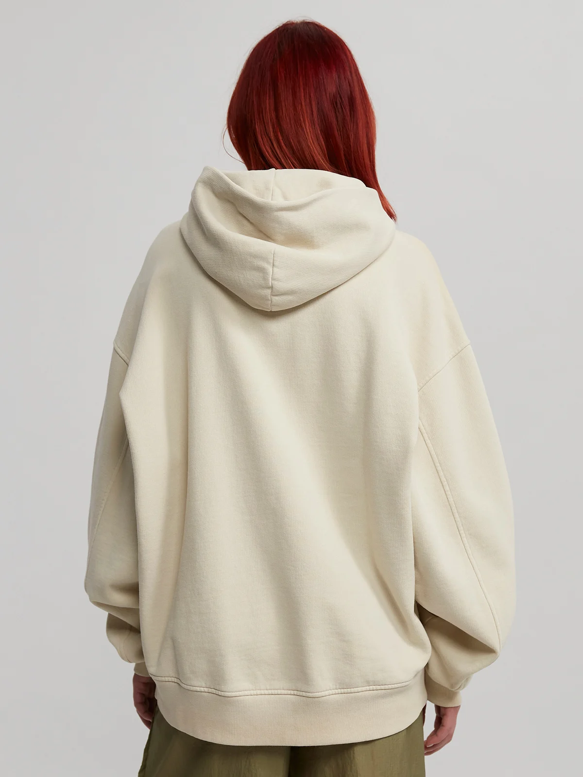 Woman wearing desert sand hoodie