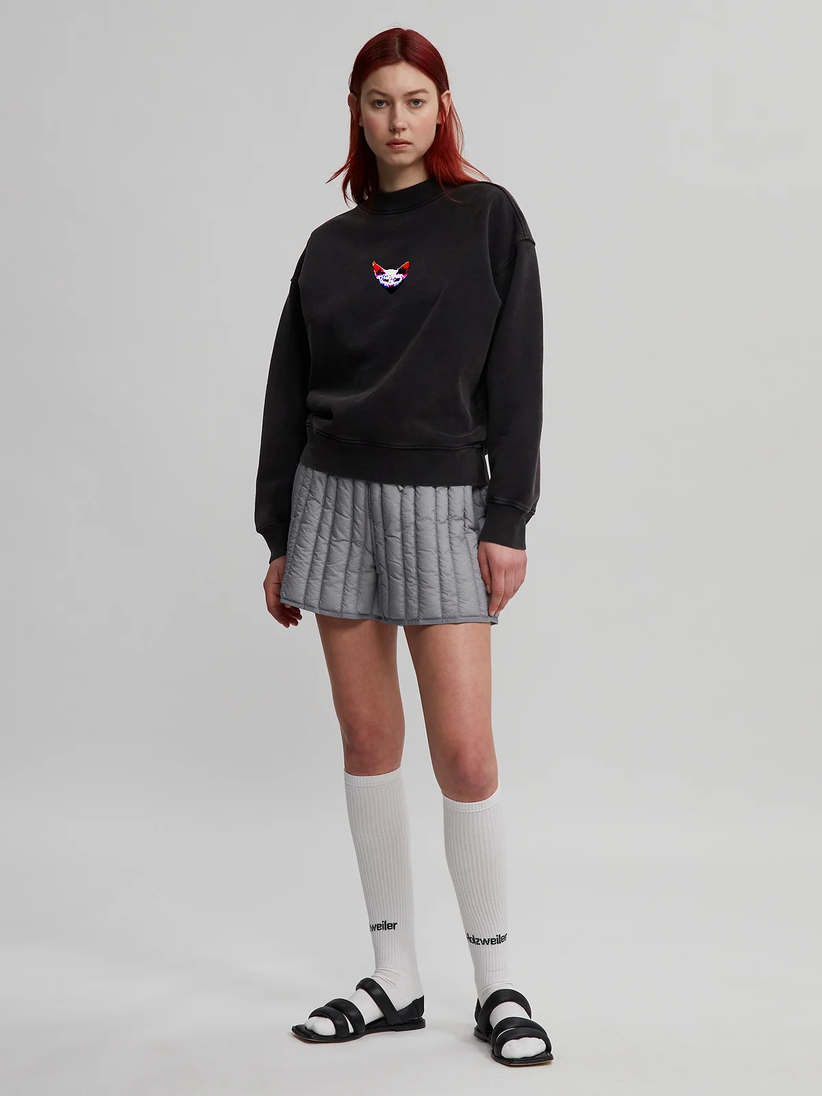Woman wearing black Crewneck