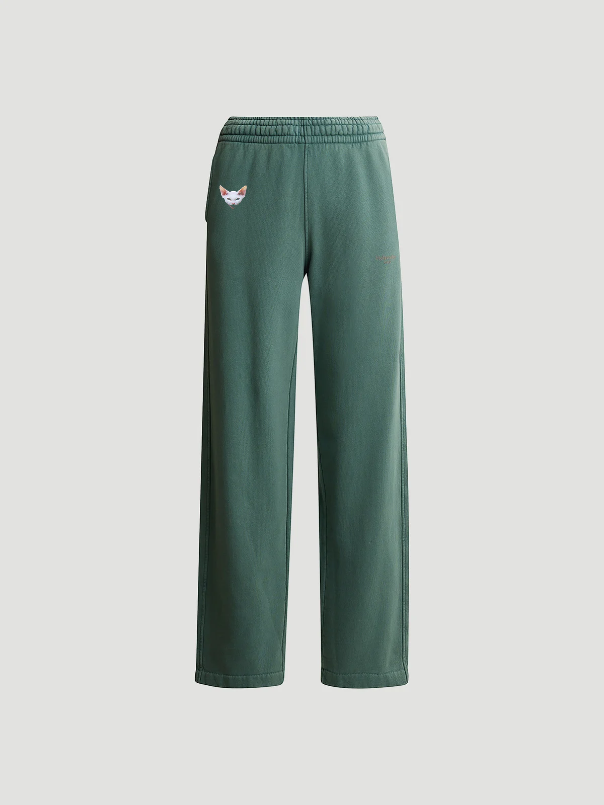Woman wearing forest green joggers